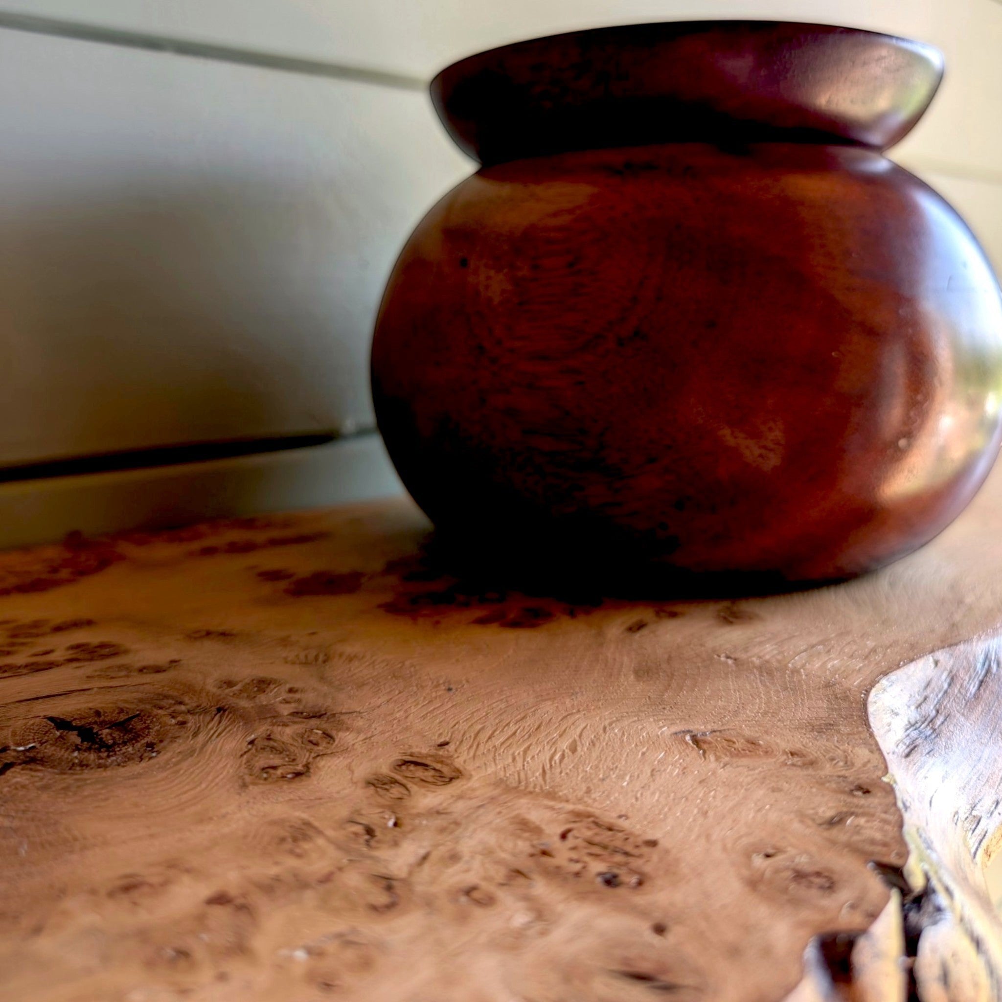 Thriverton hand-crafted pippy oak live edge shelf with natural wood grain and pips, featuring a dark wooden bowl.